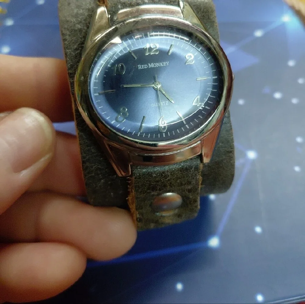 Red Monkey Blue Dial Watch on Brown Leather Cuff
